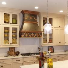Kitchen cabinets paint and faux French copper stove hood